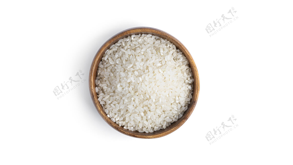 小吃木碗里的米饭被隔离在一个白色的盘子里背景高高质量的照片生的生的吃