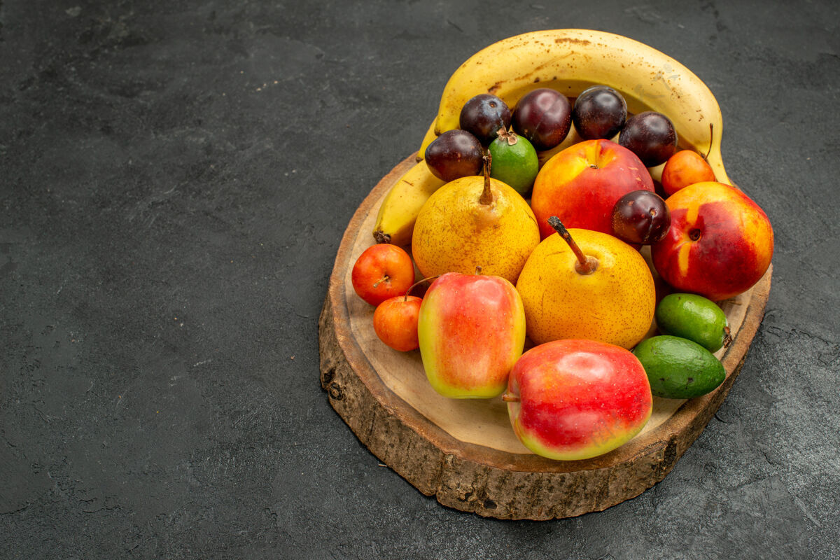 健康前视图水果组成新鲜水果上一个灰色的表颜色成熟许多新鲜水果食用水果水果新鲜