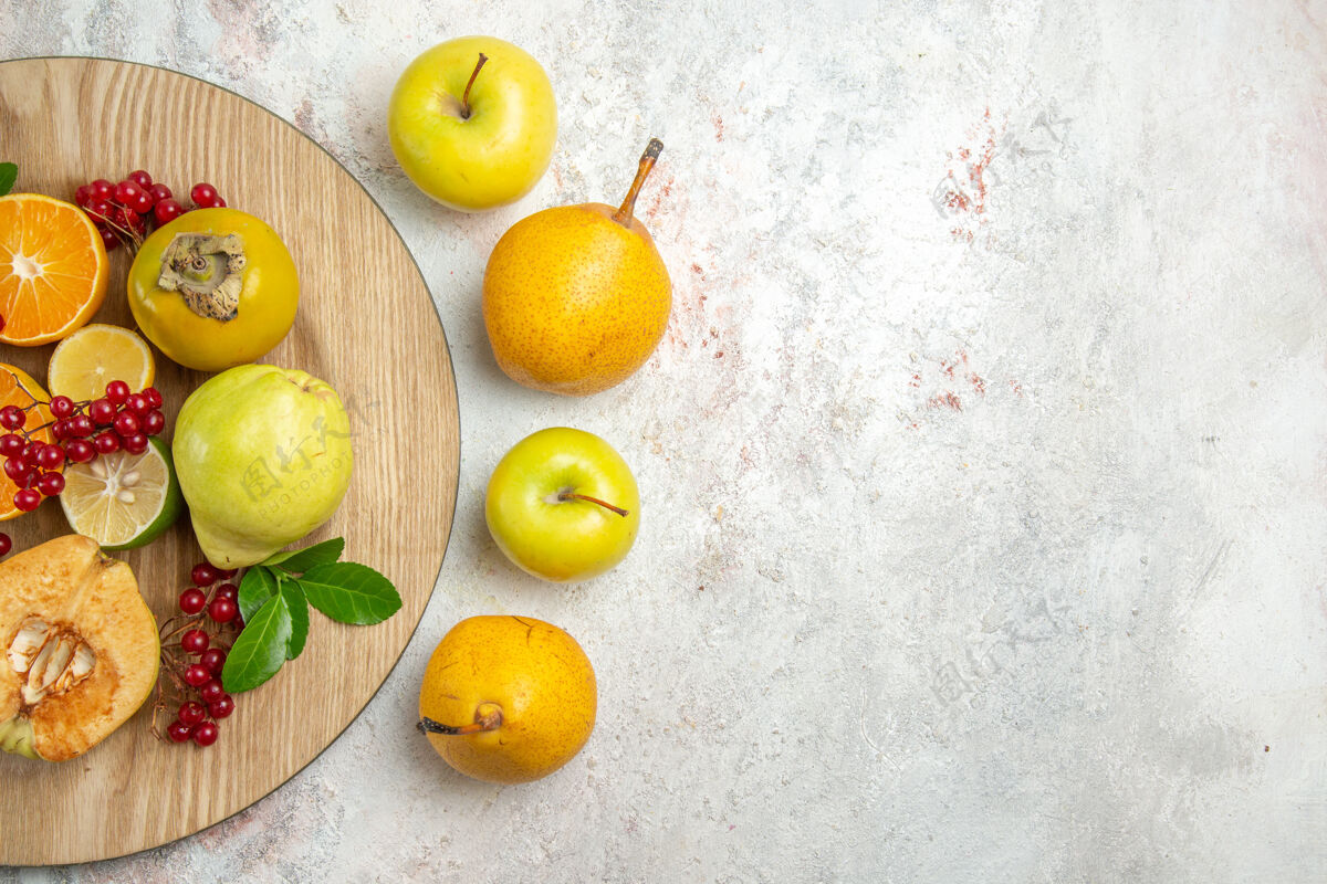 不同顶视图水果组成不同的水果在白色的桌子上柑橘柠檬水果成分