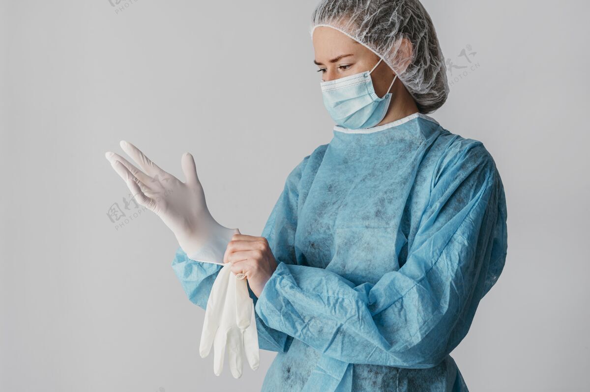 医院医生戴上手术手套保健工作专业