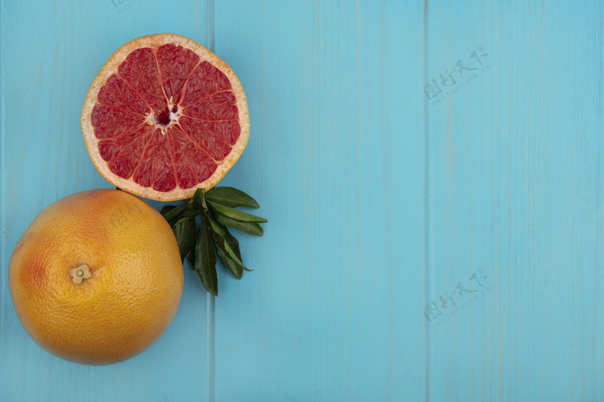 食物顶视图复制空间的绿松石背景葡萄柚绿松石景观柑橘