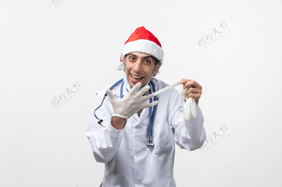 医院正面图男医生戴着手套对白墙病毒假日的感慨圣诞节穿成人
